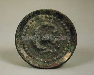 銅製走獣文円鏡